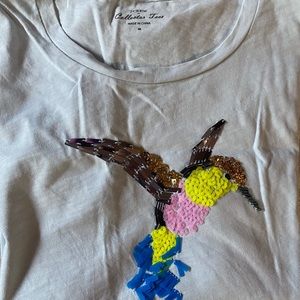 J Crew light blue tee with a sweet jeweled hummingbird, size M